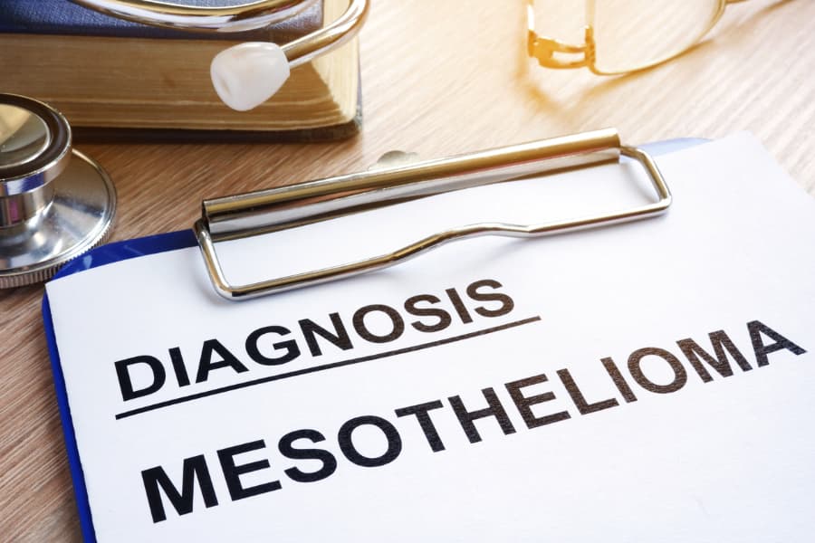 Close-up of a stethoscope and clipboard with a paper that says, “Diagnosis mesothelioma.”